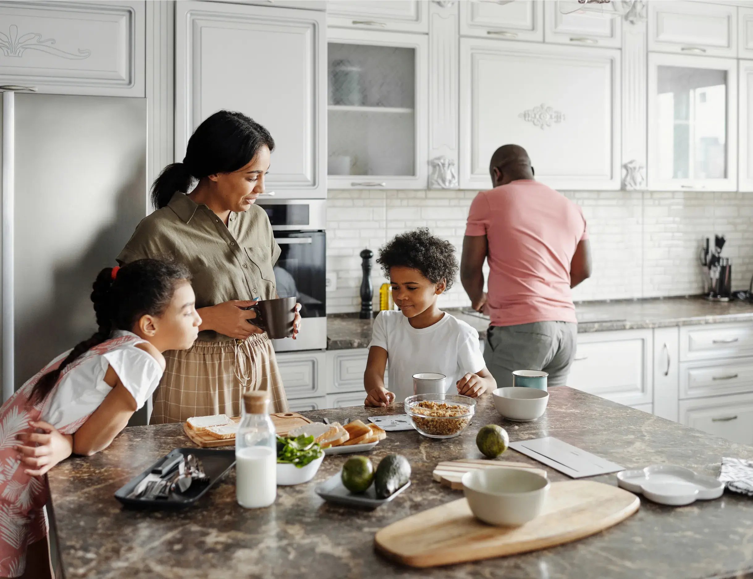 Happy-family-working-in-kitchen