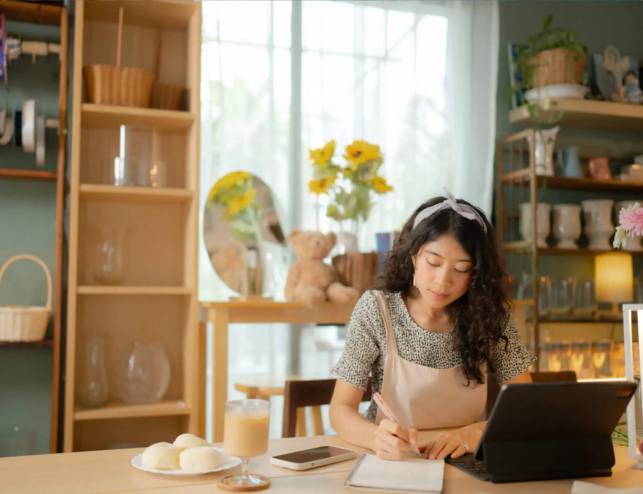 Shop-owner-calculating-finances